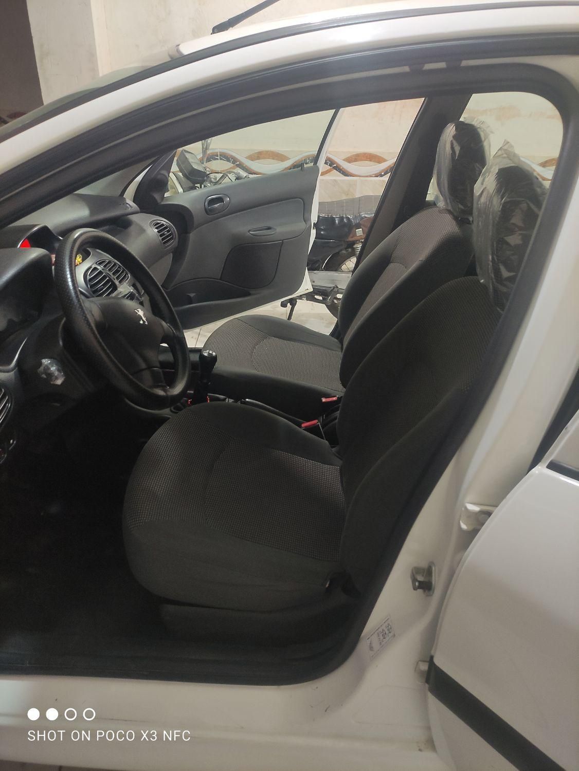 پژو ۲۰۶ صندوق دار v8 - 1396
