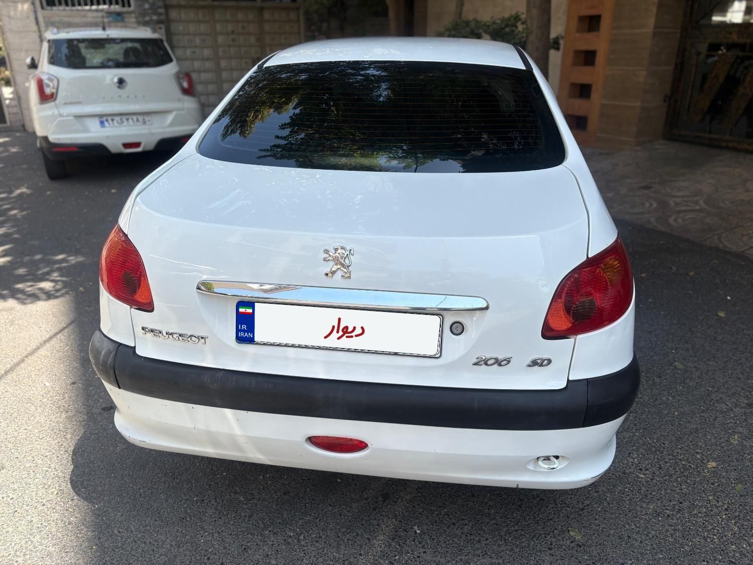پژو ۲۰۶ صندوق دار v8 - 1394