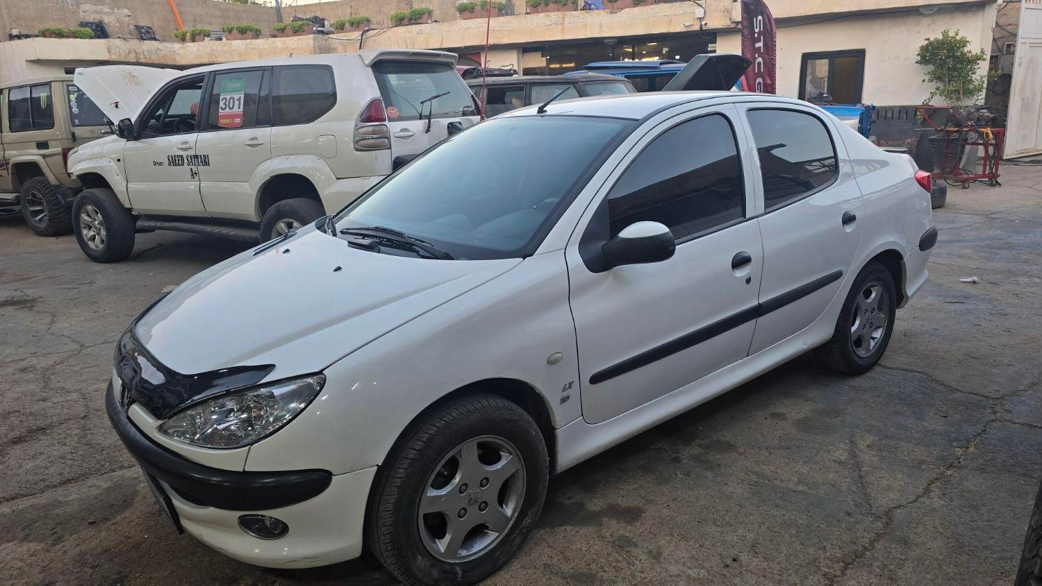 پژو ۲۰۶ صندوق دار v8 - 1396