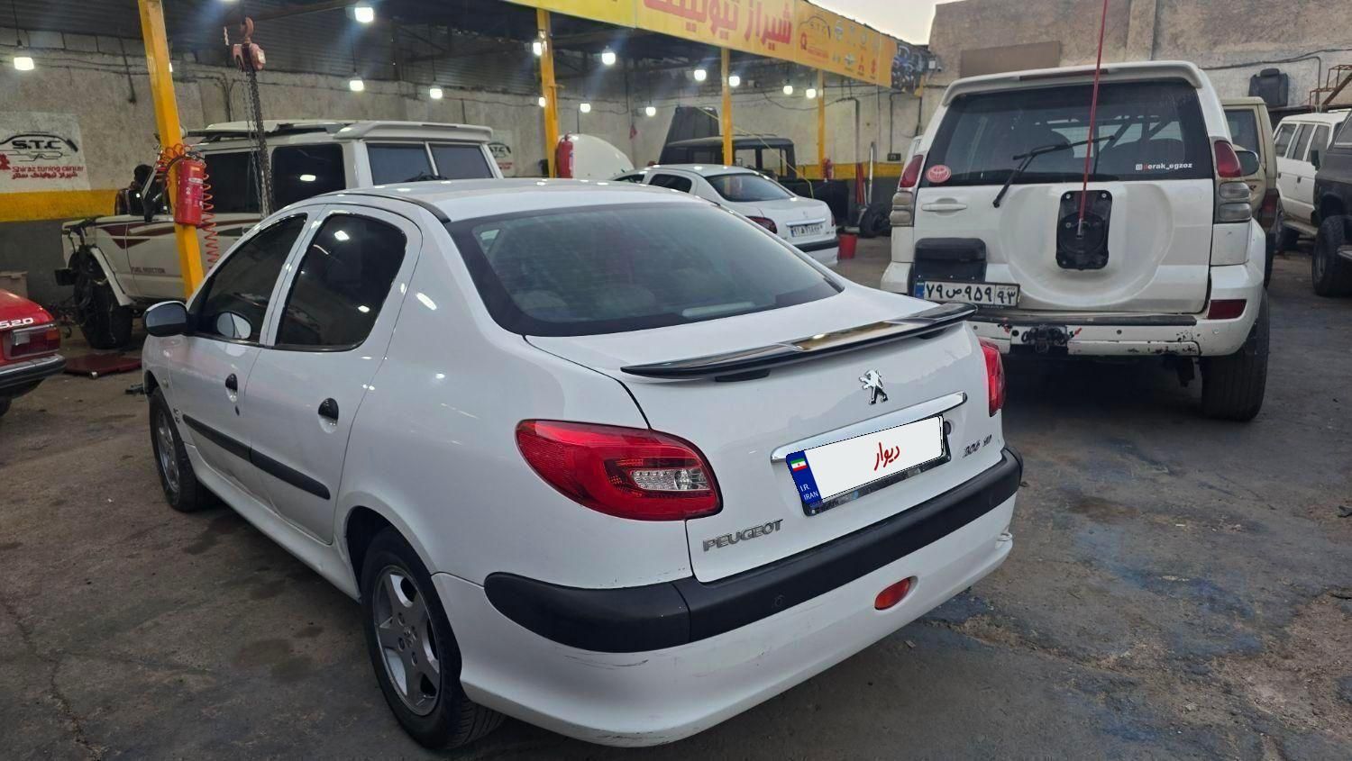 پژو ۲۰۶ صندوق دار v8 - 1396