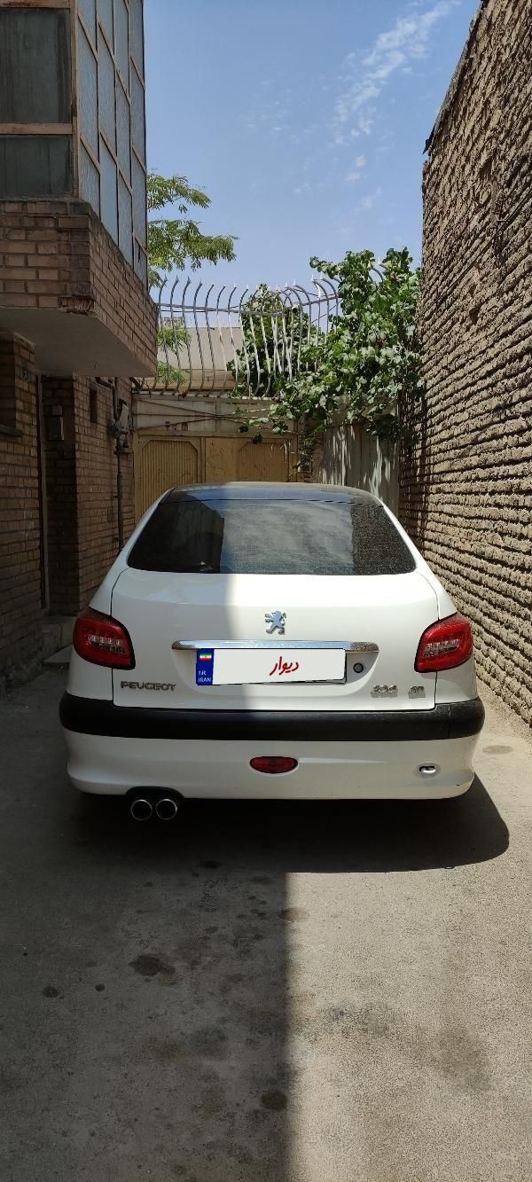 پژو ۲۰۶ صندوق دار v8 - 1400