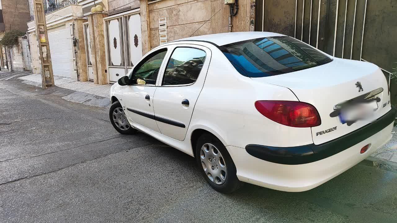 پژو ۲۰۶ صندوق دار v8 - 1397