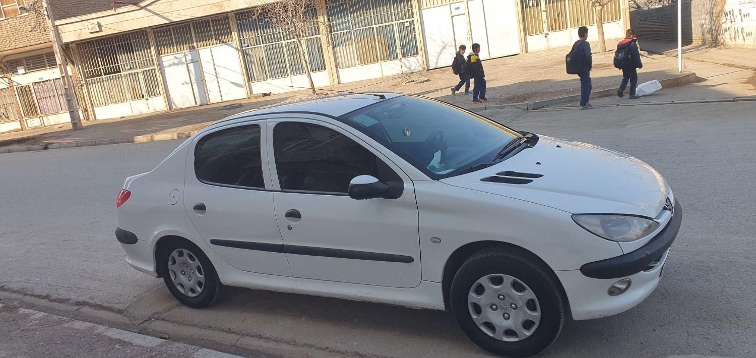 پژو ۲۰۶ صندوق دار v8 - 1396