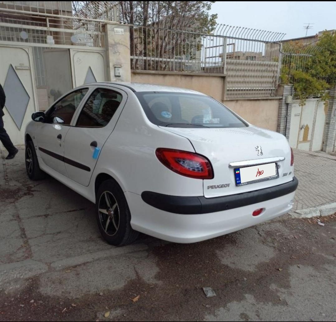 پژو ۲۰۶ صندوق دار v8 - 1397