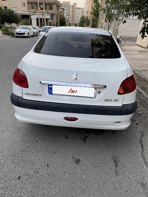 پژو ۲۰۶ صندوق دار v8 - 1394