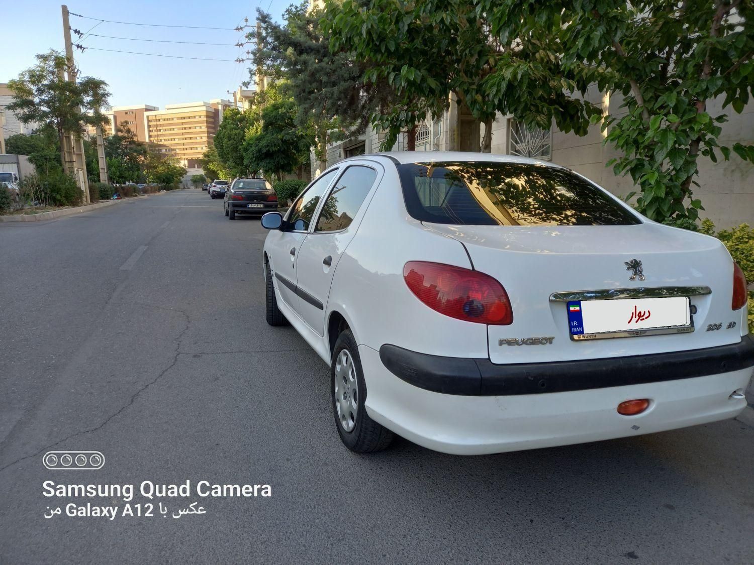 پژو ۲۰۶ صندوق دار v8 - 1396