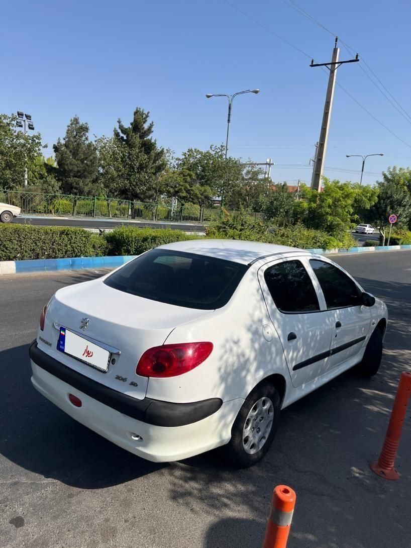 پژو ۲۰۶ صندوق دار v8 - 1390