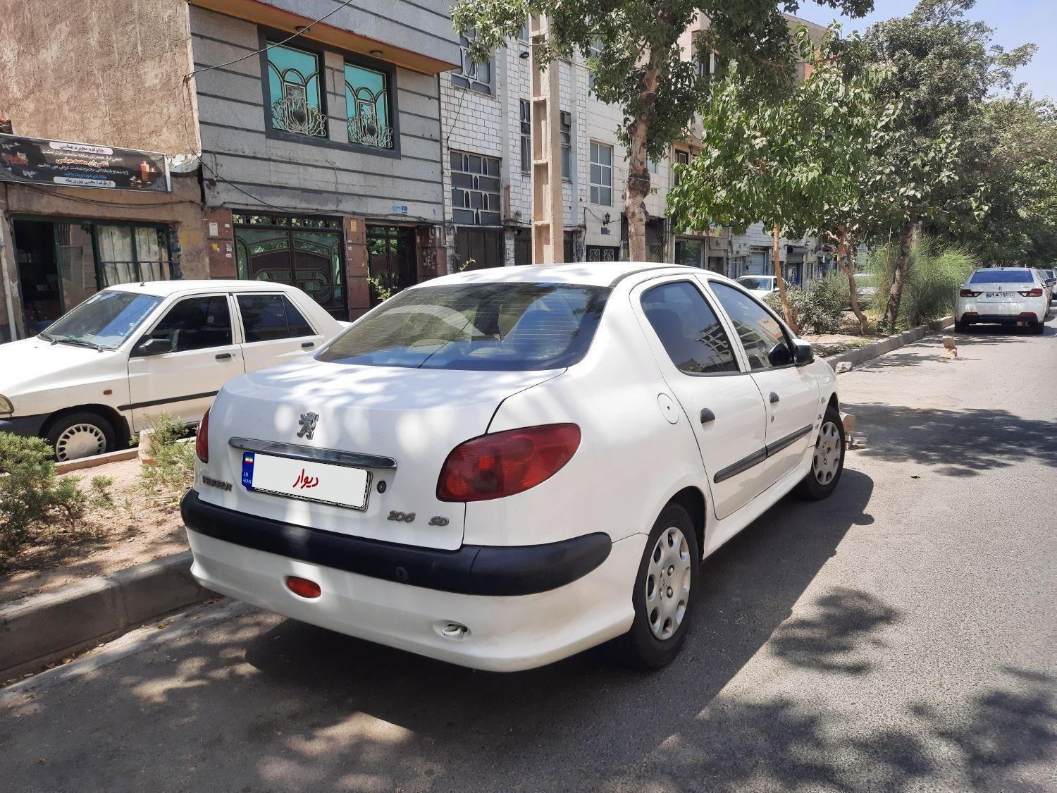 پژو ۲۰۶ صندوق دار v8 - 1396