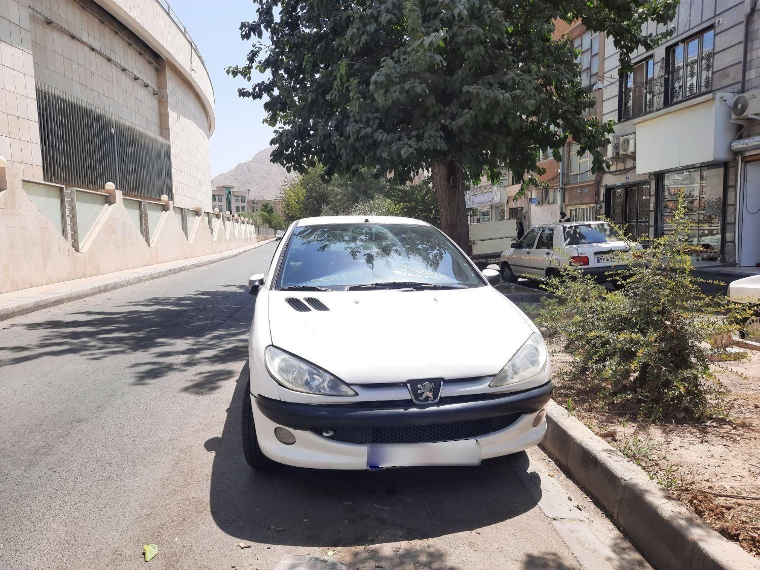 پژو ۲۰۶ صندوق دار v8 - 1396