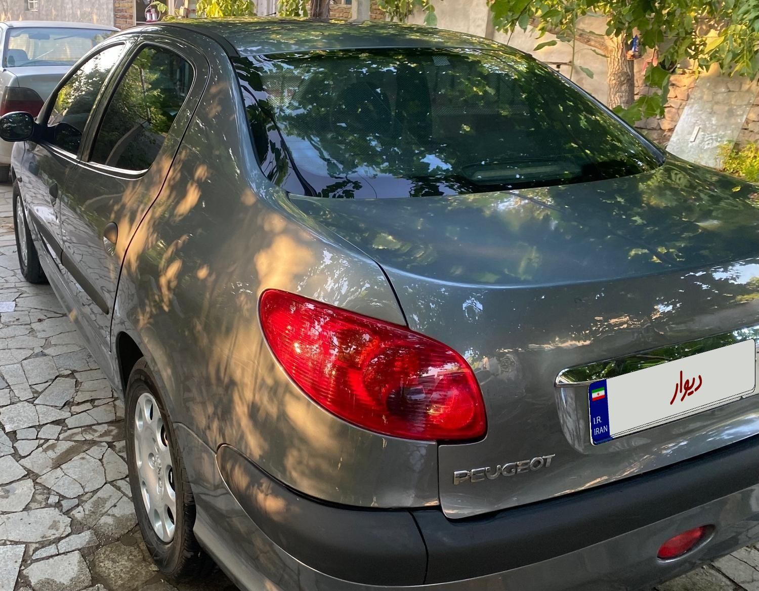پژو ۲۰۶ صندوق دار v20 - 1388