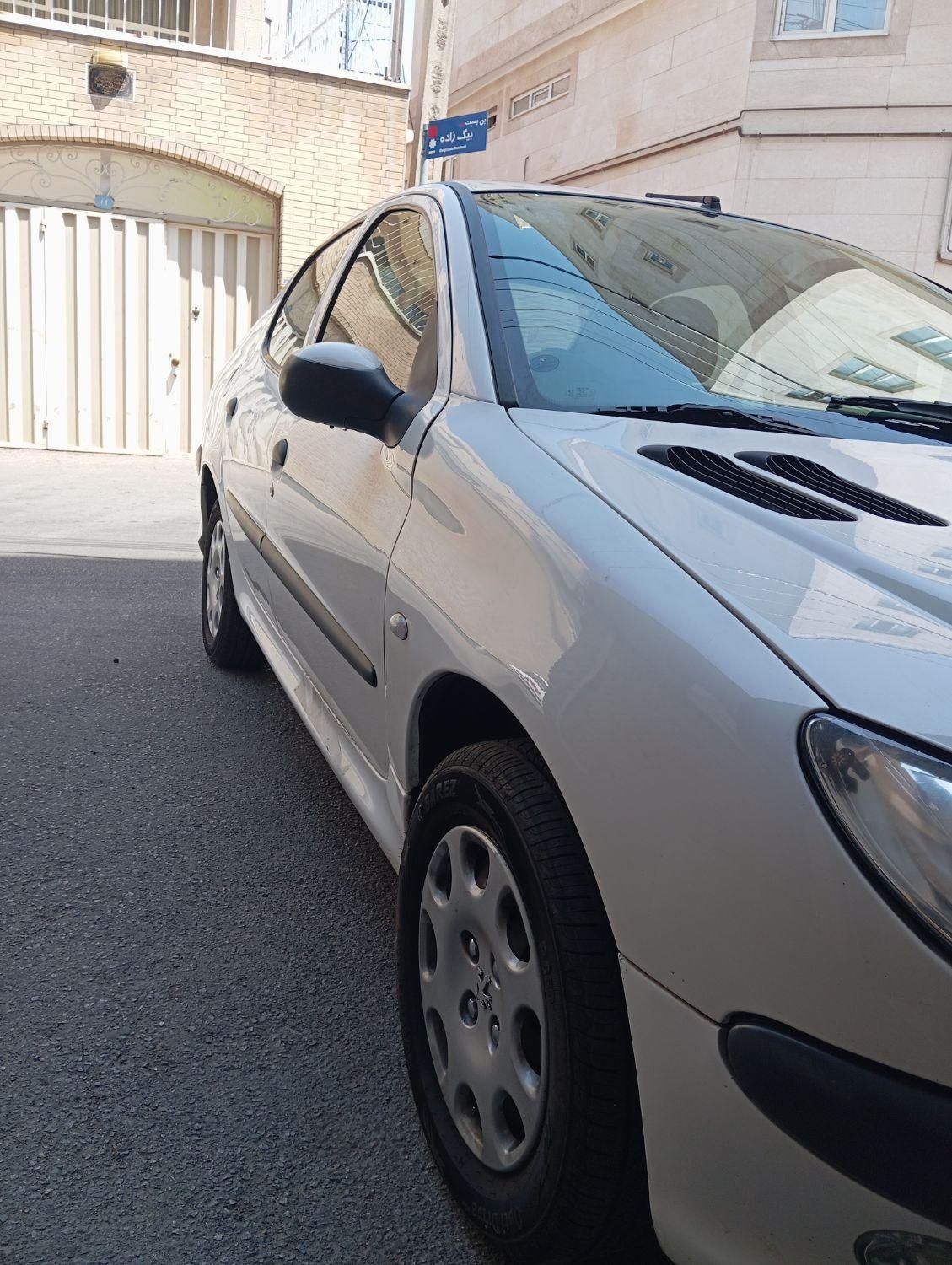 پژو ۲۰۶ صندوق دار v8 - 1399