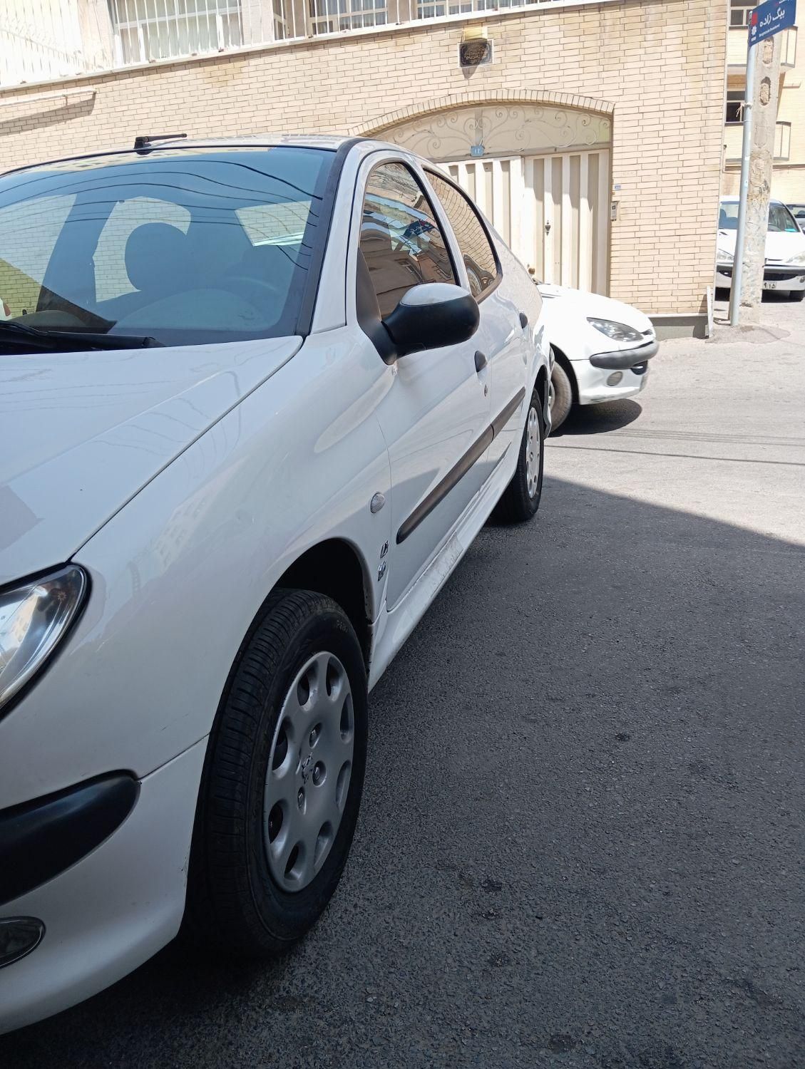 پژو ۲۰۶ صندوق دار v8 - 1399