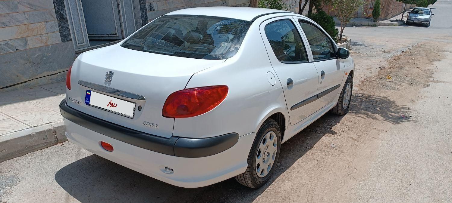 پژو ۲۰۶ صندوق دار v9 - 1390