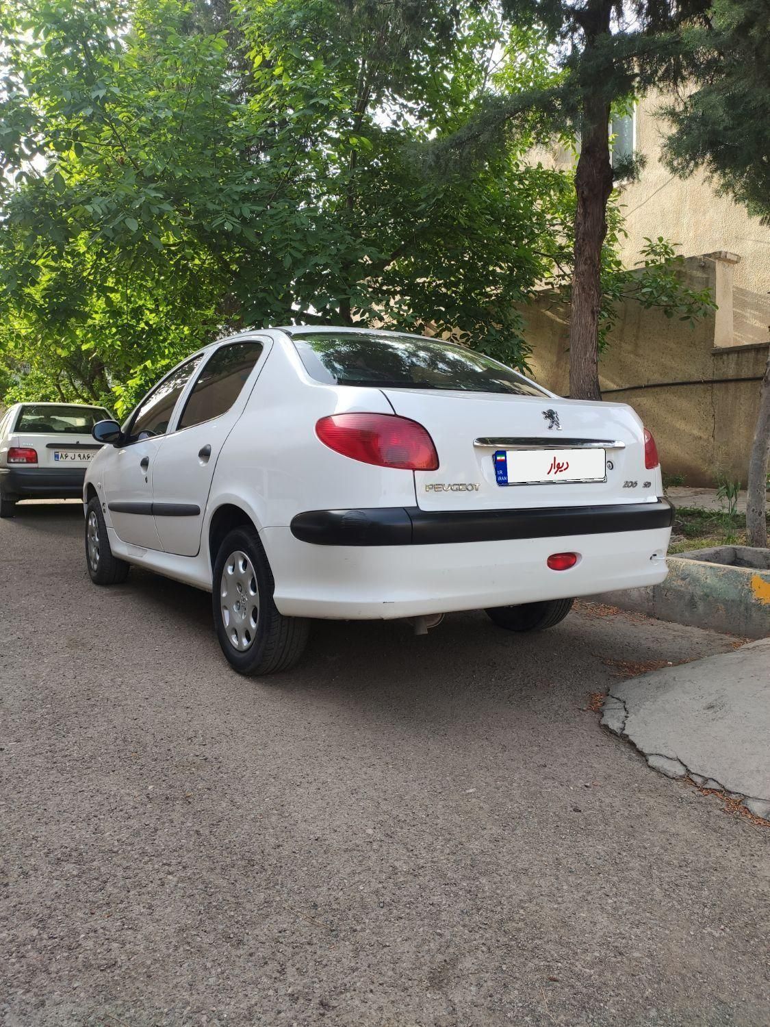 پژو ۲۰۶ صندوق دار v8 - 1398