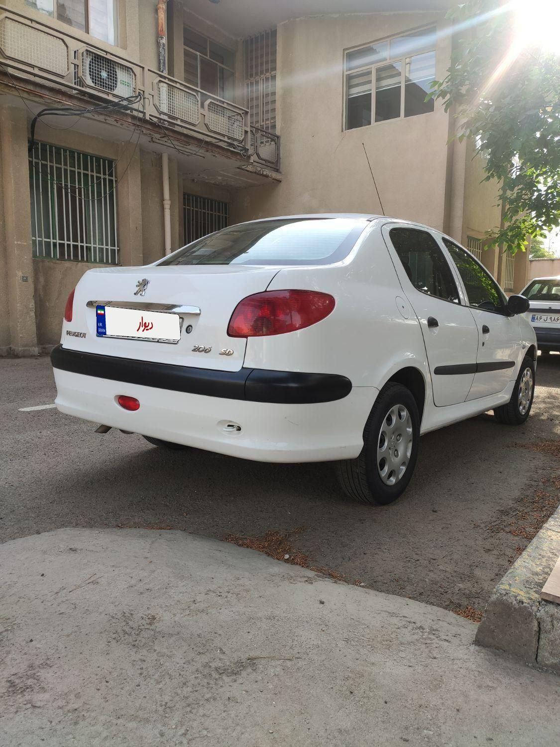 پژو ۲۰۶ صندوق دار v8 - 1398