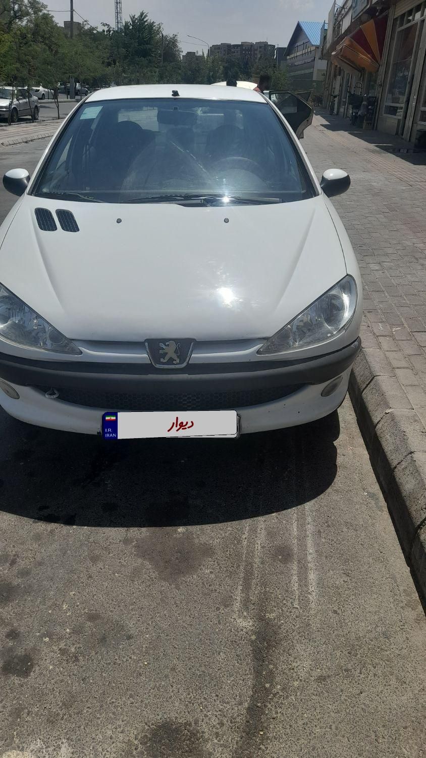 پژو ۲۰۶ صندوق دار v8 - 1396