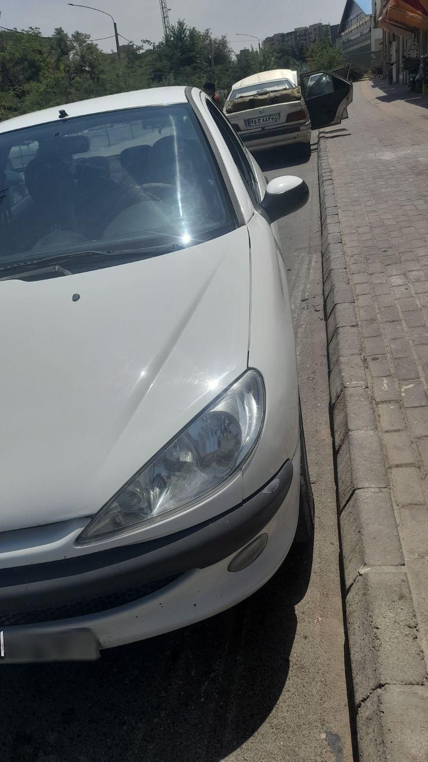 پژو ۲۰۶ صندوق دار v8 - 1396