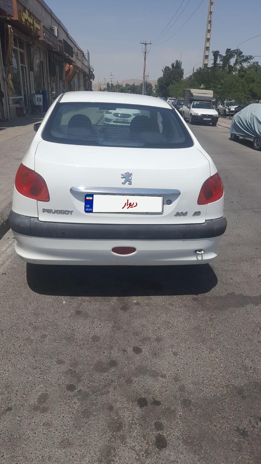 پژو ۲۰۶ صندوق دار v8 - 1396