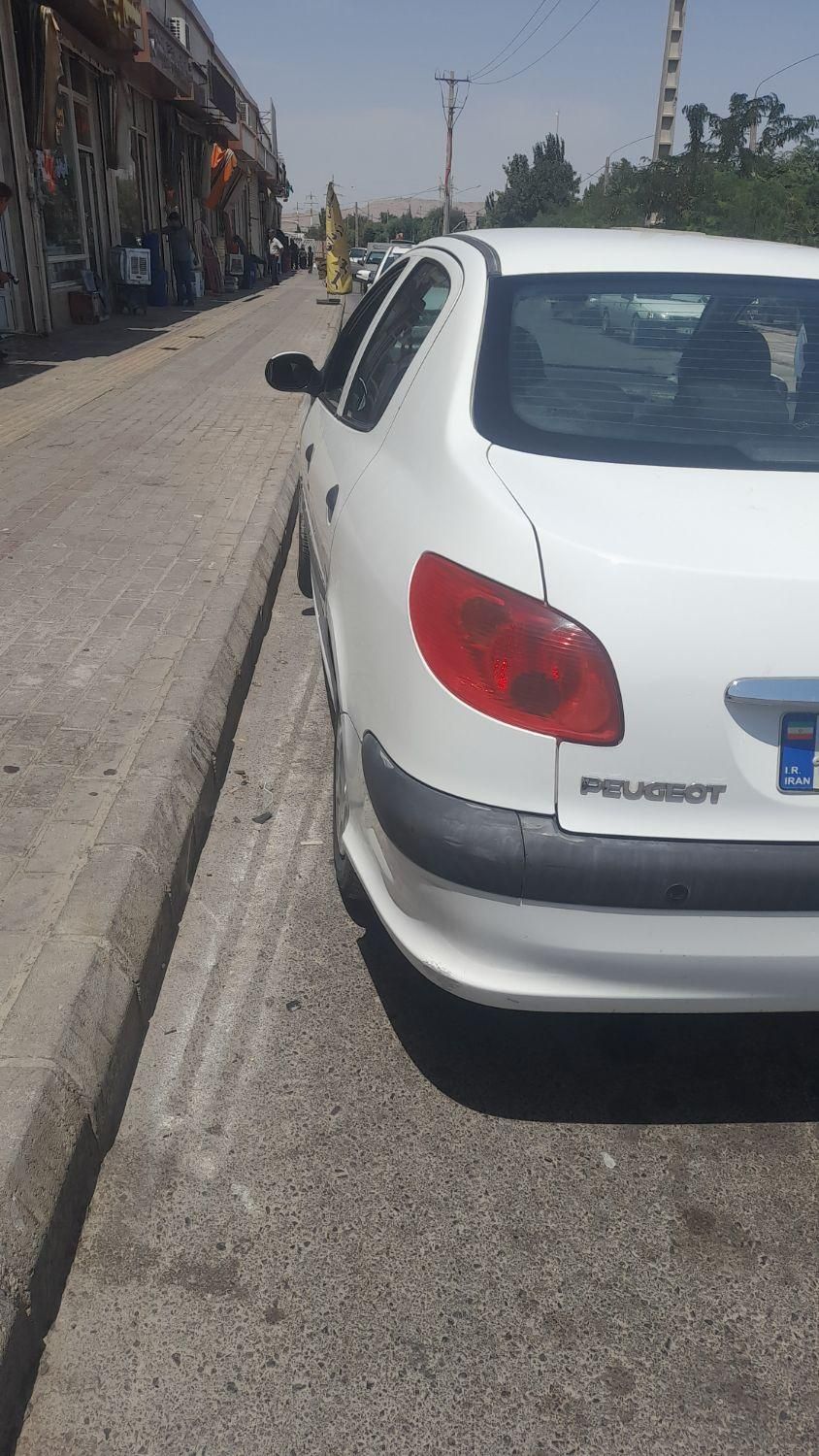 پژو ۲۰۶ صندوق دار v8 - 1396