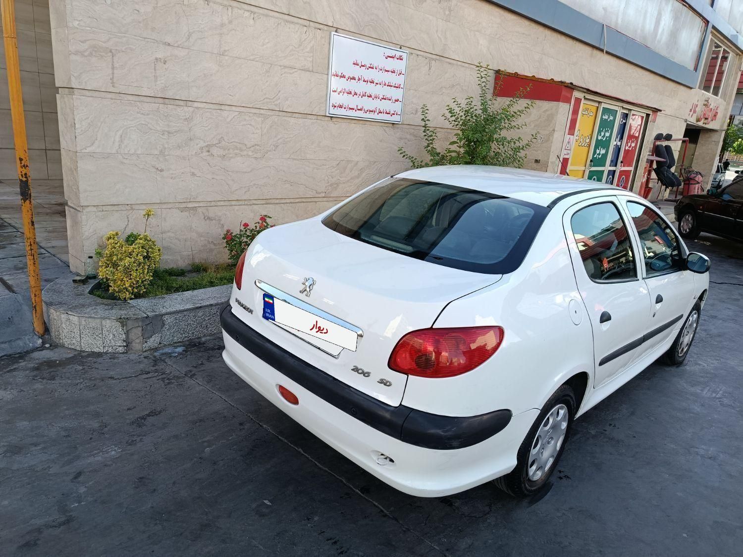 پژو ۲۰۶ صندوق دار v8 - 1394