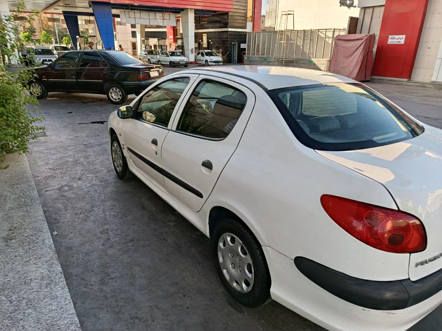 پژو ۲۰۶ صندوق دار v8 - 1394