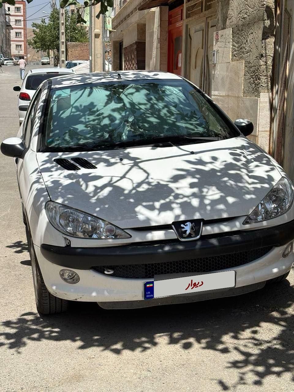 پژو ۲۰۶ صندوق دار v8 - 1397