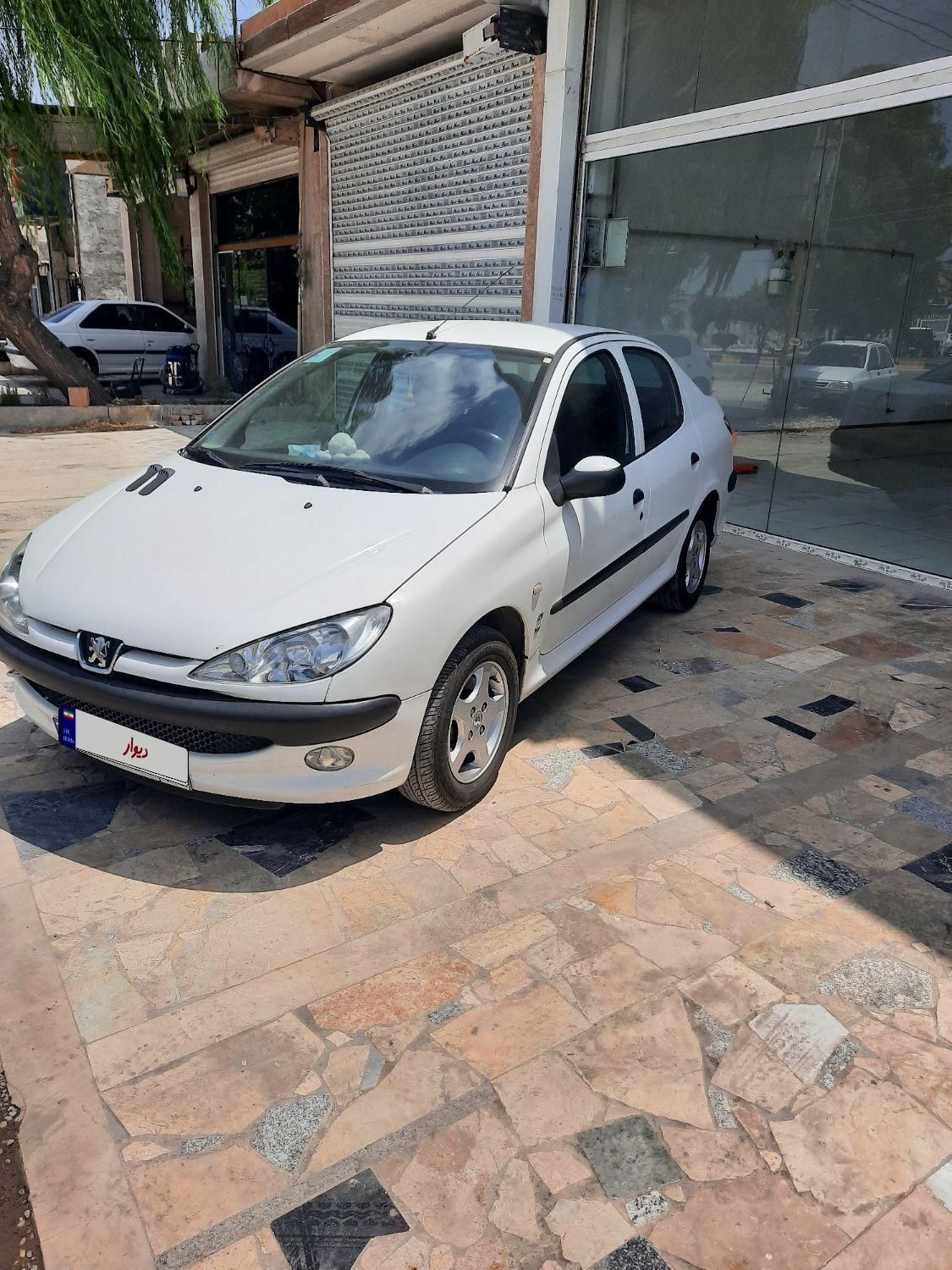 پژو ۲۰۶ صندوق دار v8 - 1394