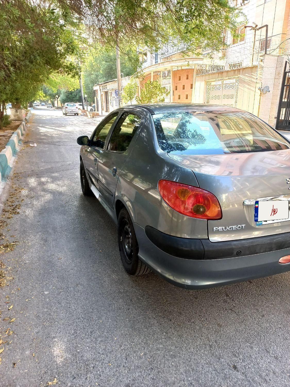 پژو ۲۰۶ صندوق دار v8 - 1393