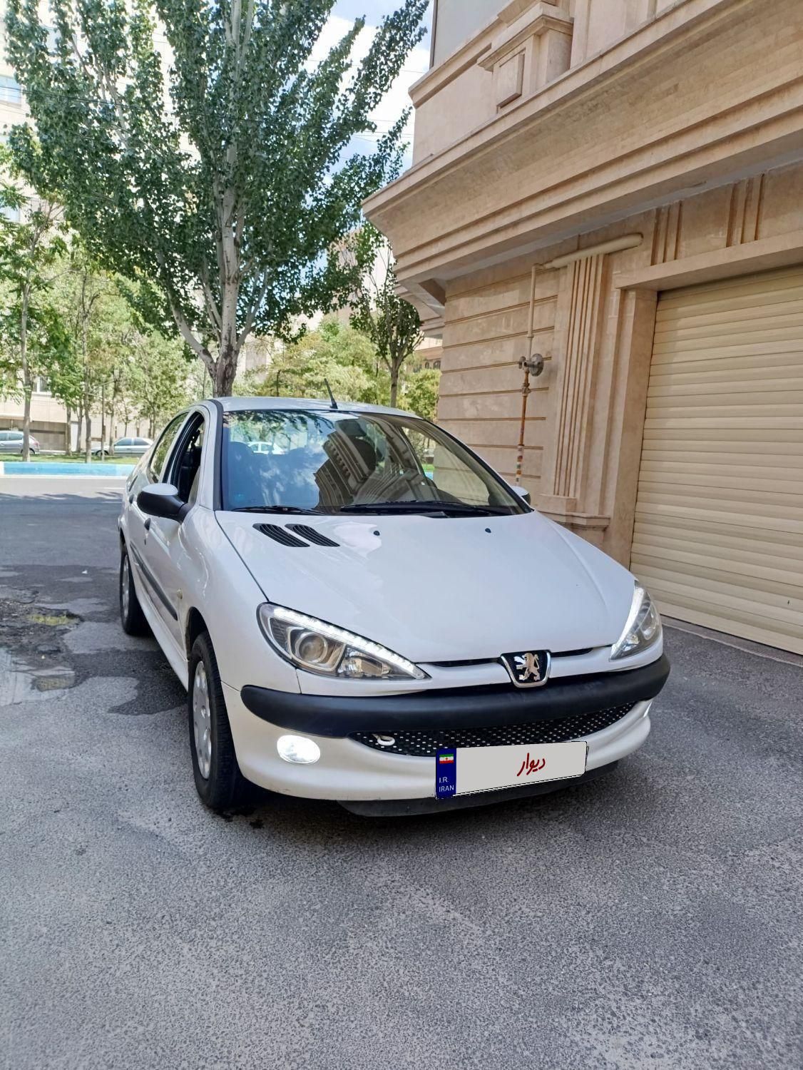 پژو ۲۰۶ صندوق دار v8 - 1395