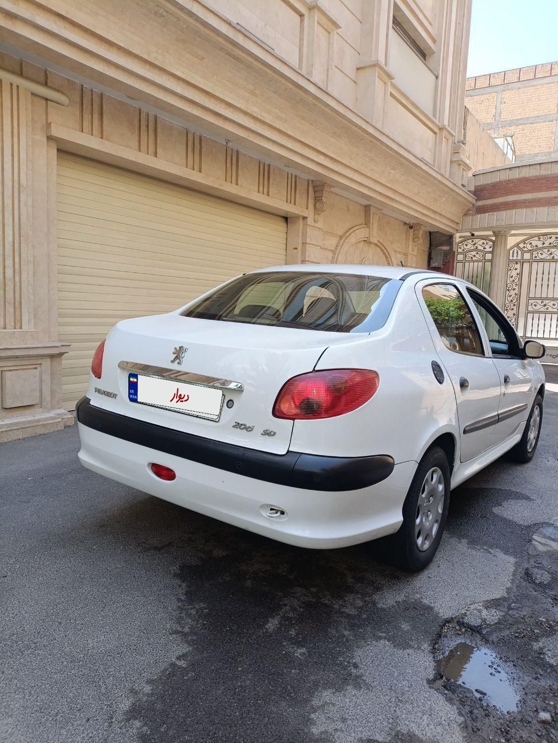 پژو ۲۰۶ صندوق دار v8 - 1395