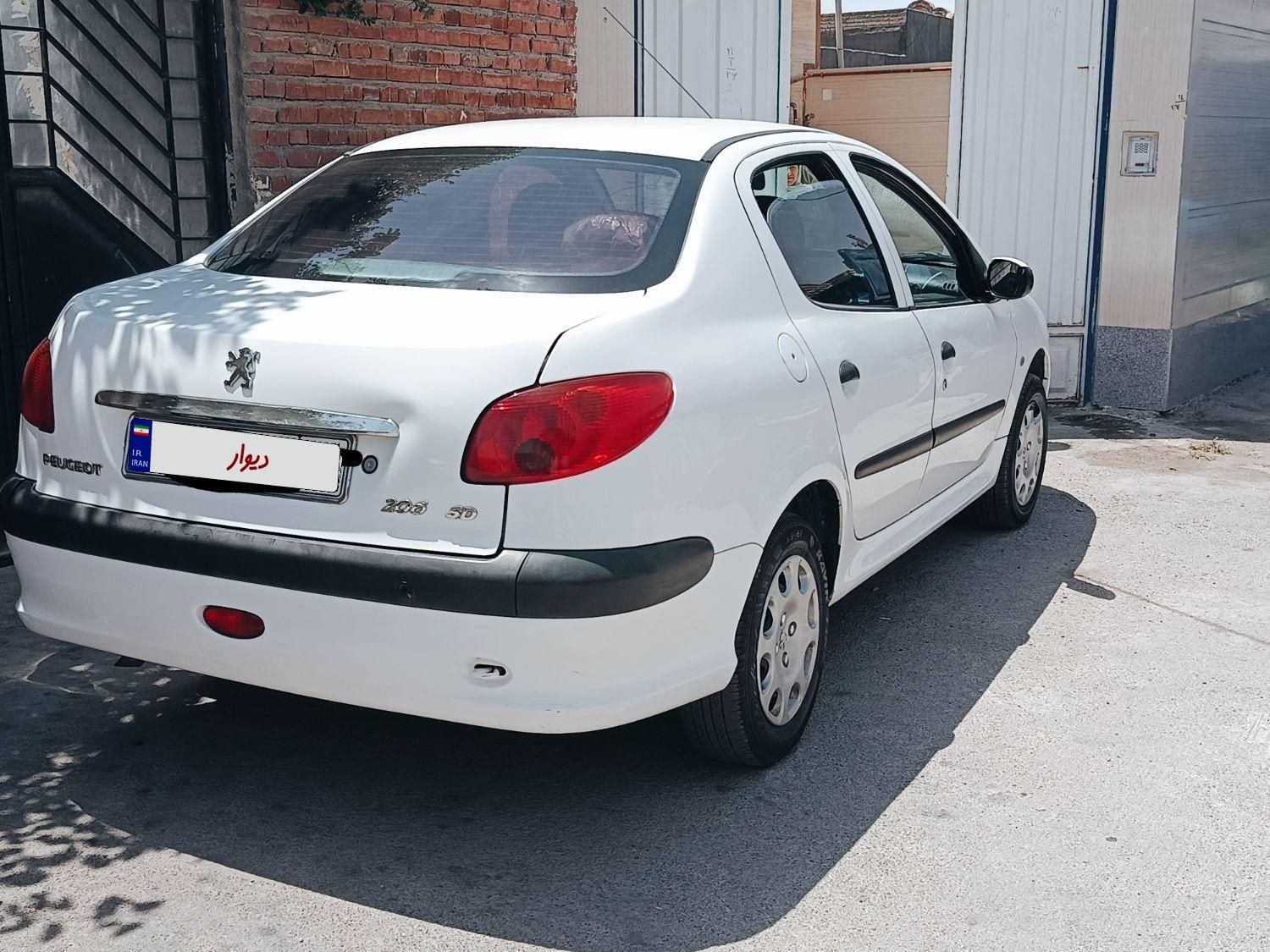 پژو ۲۰۶ صندوق دار v8 - 1397