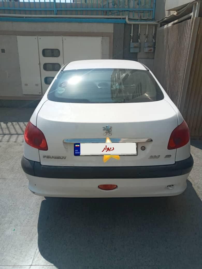 پژو ۲۰۶ صندوق دار v8 - 1399