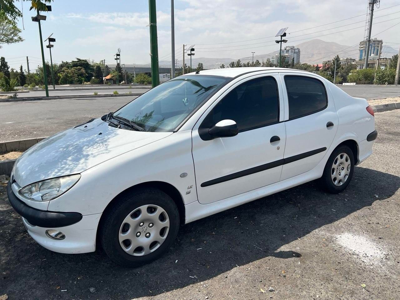 پژو ۲۰۶ صندوق دار v8 - 1396