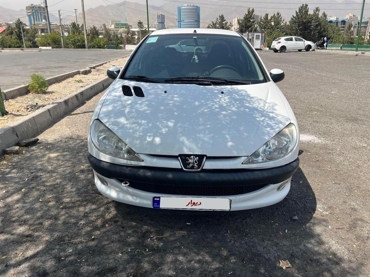 پژو ۲۰۶ صندوق دار v8 - 1396