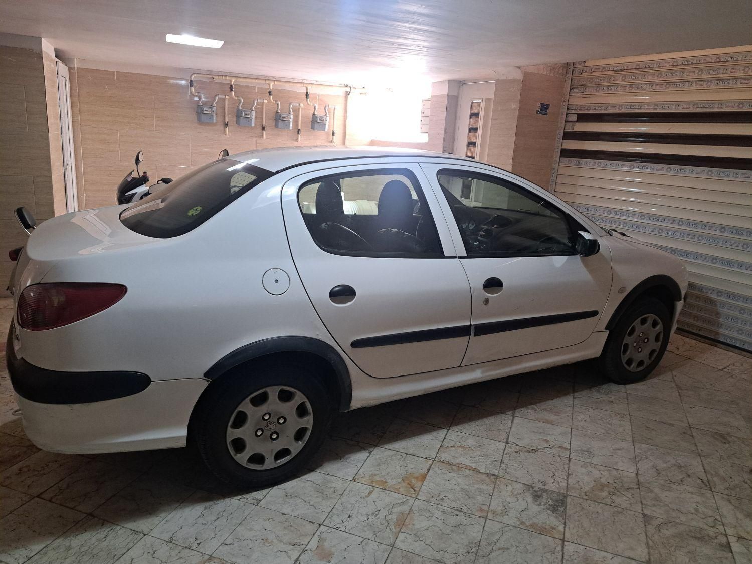 پژو ۲۰۶ صندوق دار v8 - 1391