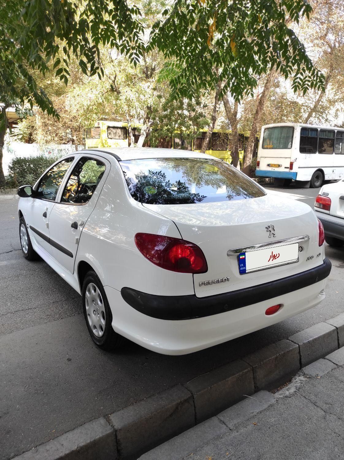 پژو ۲۰۶ صندوق دار v8 - 1393