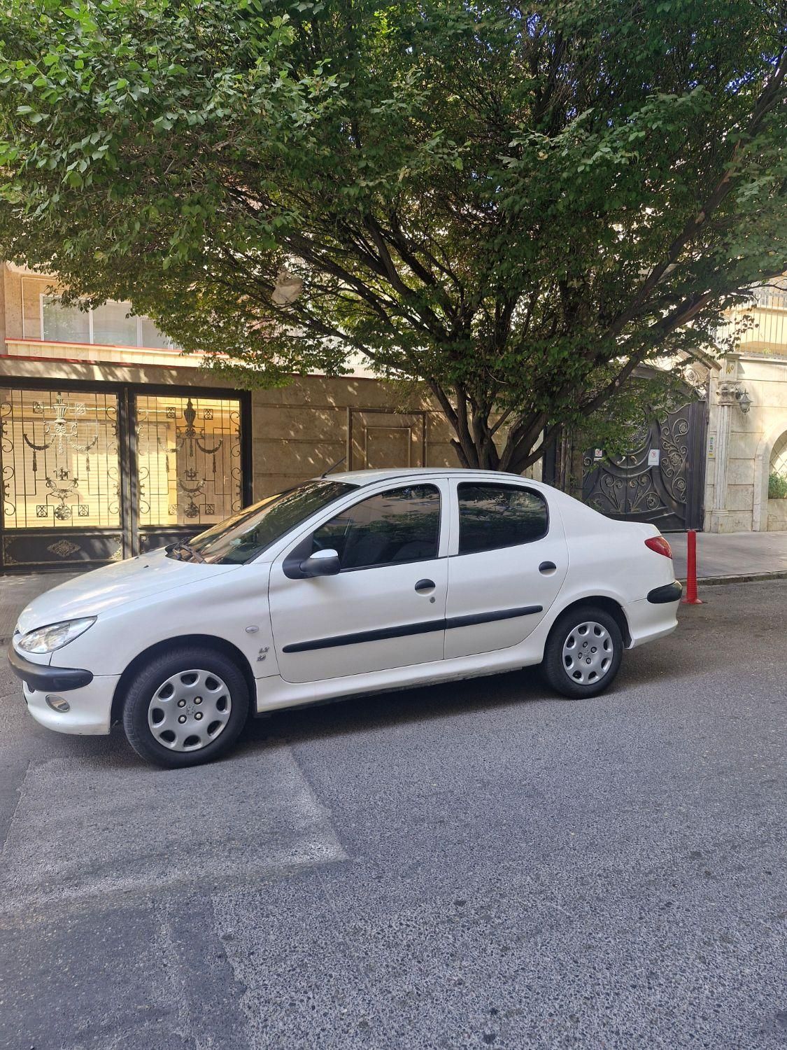پژو ۲۰۶ صندوق دار v8 - 1396