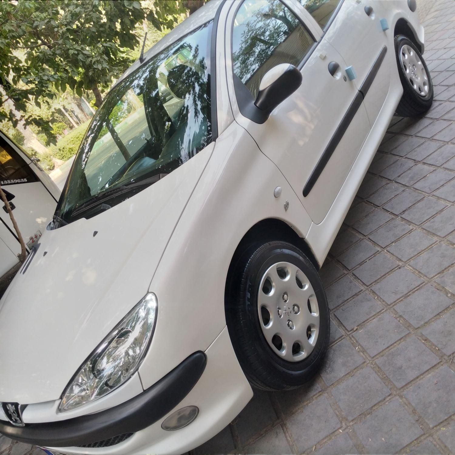 پژو ۲۰۶ صندوق دار v8 - 1394