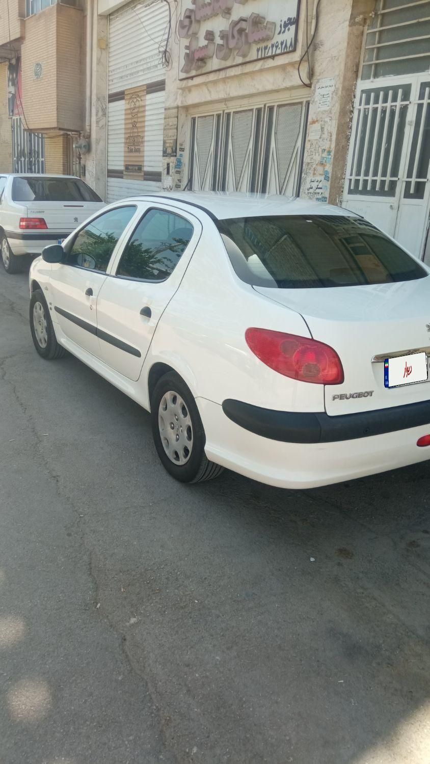 پژو ۲۰۶ صندوق دار v8 - 1395