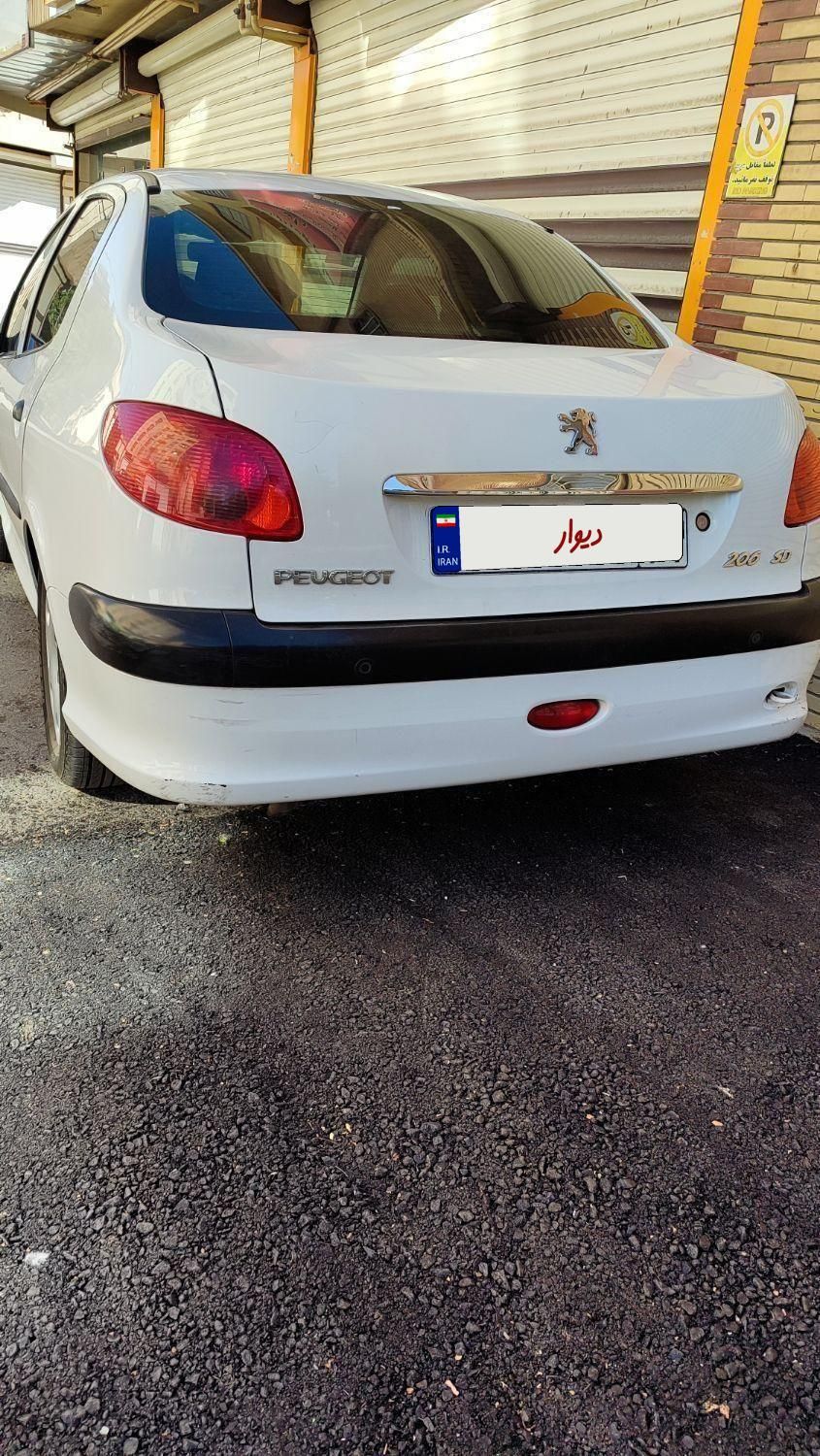پژو ۲۰۶ صندوق دار v8 - 1396