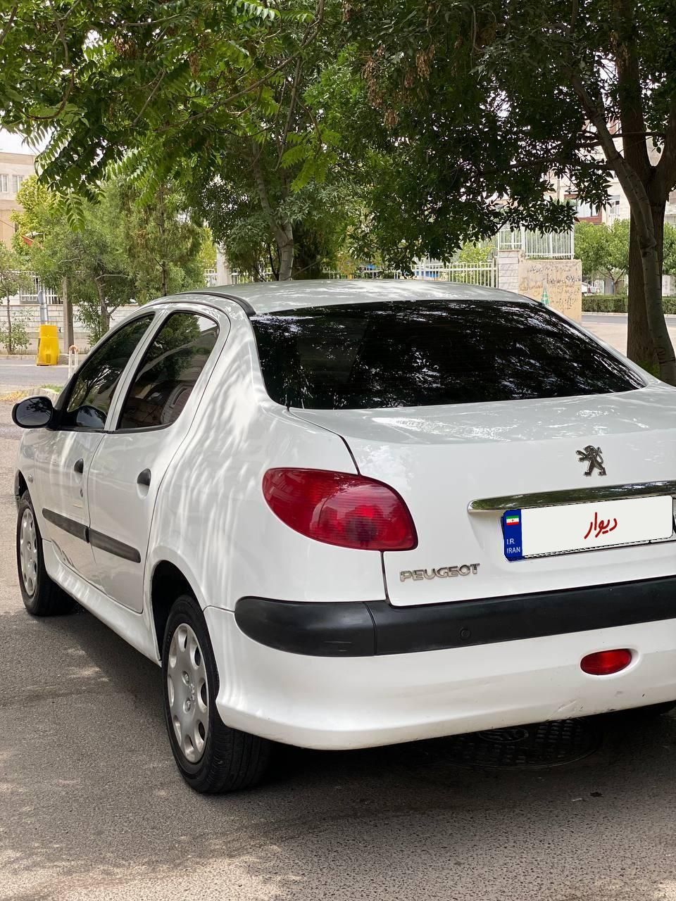 پژو ۲۰۶ صندوق دار v8 - 1396
