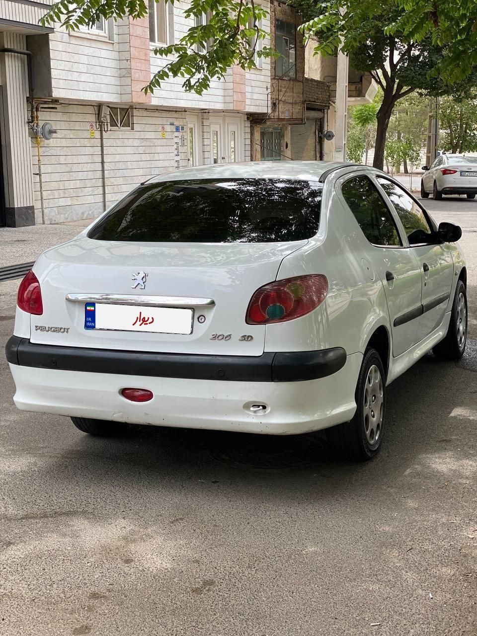 پژو ۲۰۶ صندوق دار v8 - 1396