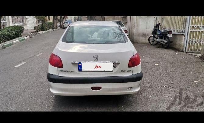 پژو ۲۰۶ صندوق دار v8 - 1397