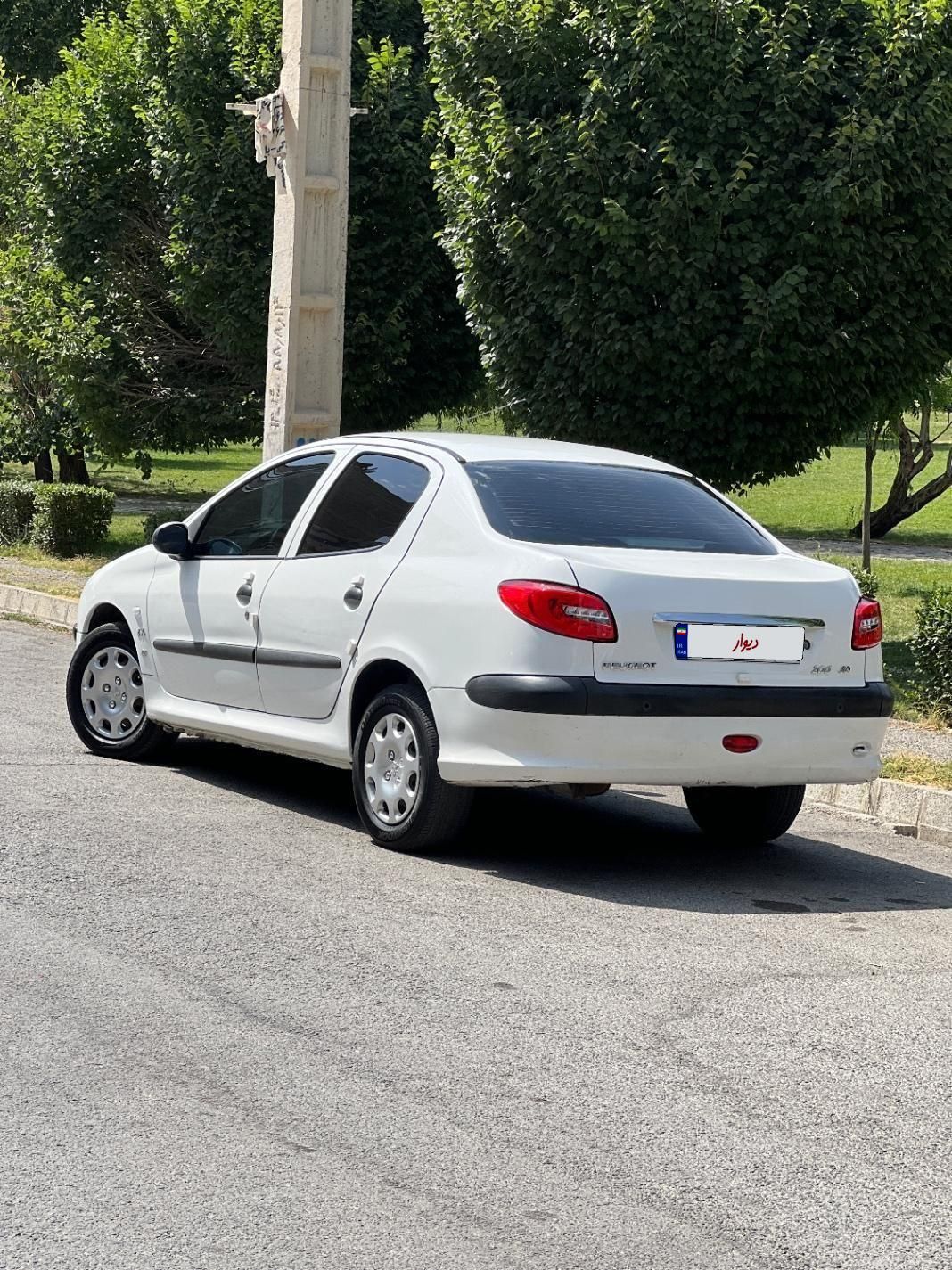 پژو ۲۰۶ صندوق دار v8 - 1395