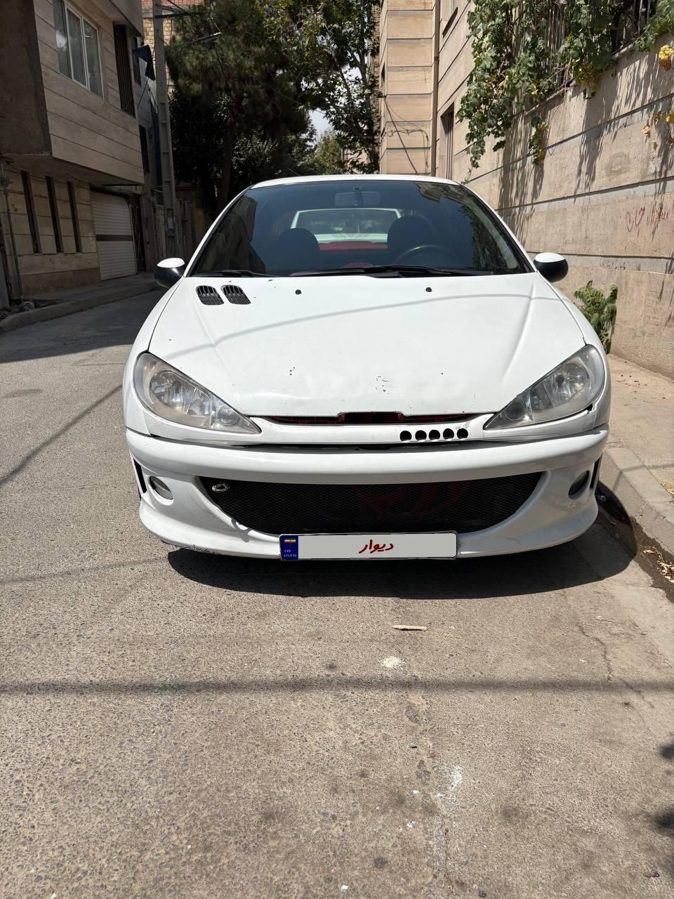 خودرو پژو، ۲۰۶ صندوق دار آگهی ann_19540620
