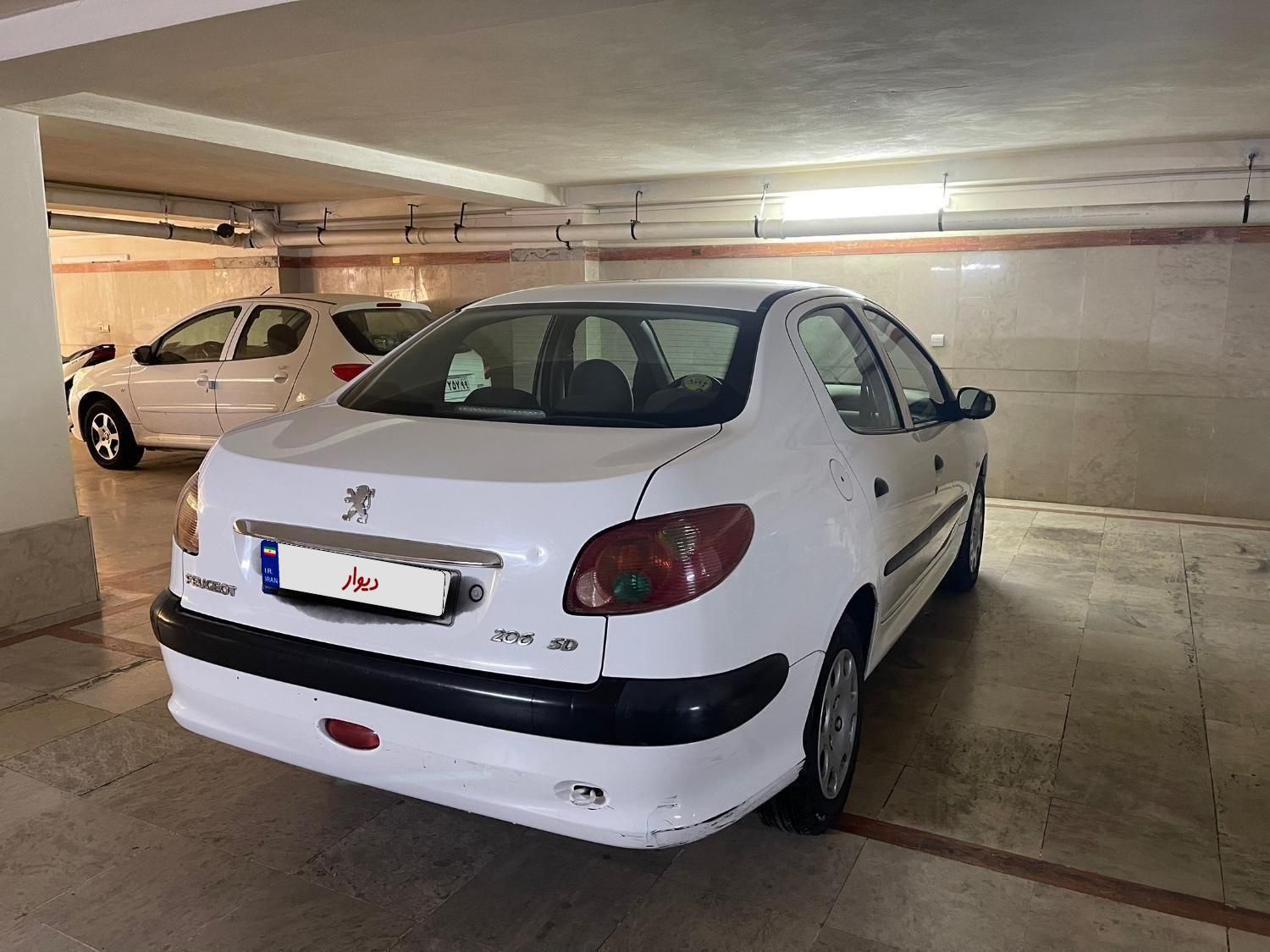 پژو ۲۰۶ صندوق دار v8 - 1391