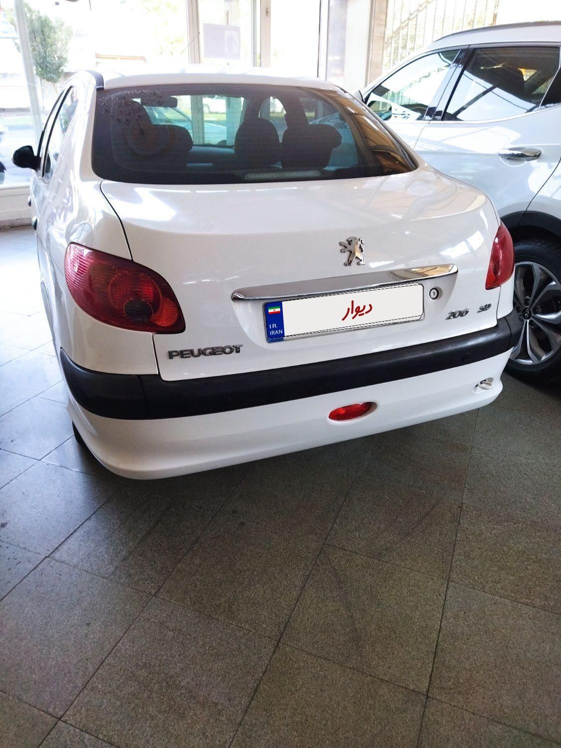 پژو ۲۰۶ صندوق دار v8 - 1394