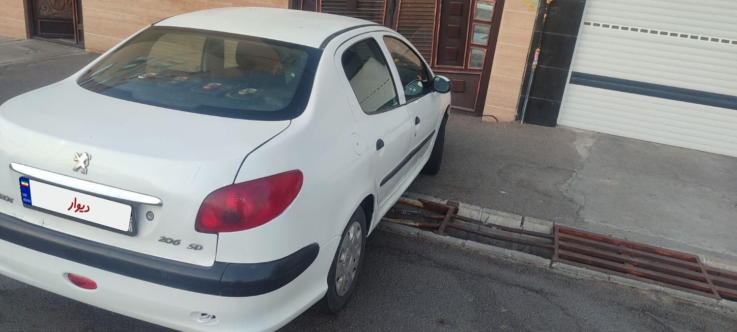 پژو ۲۰۶ صندوق دار v8 - 1391