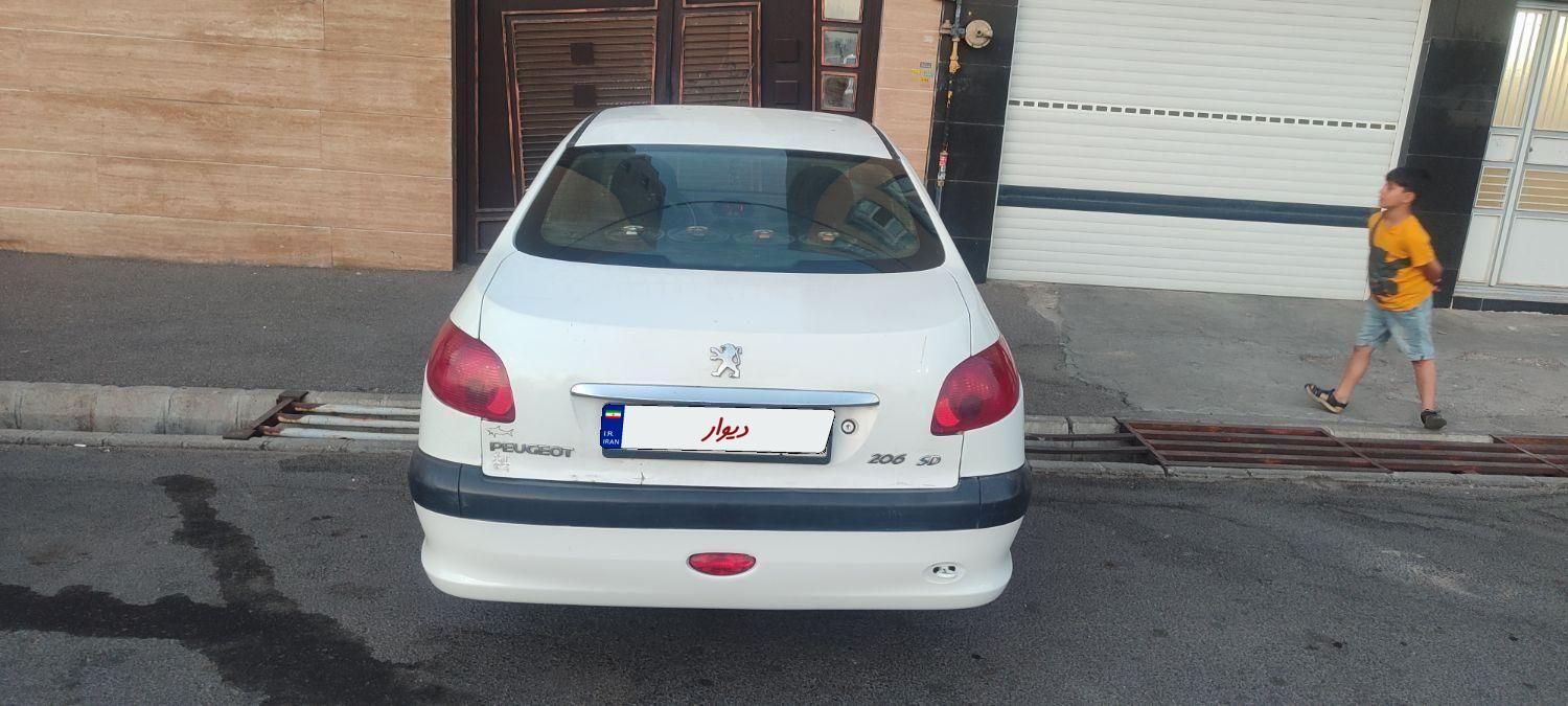 پژو ۲۰۶ صندوق دار v8 - 1391