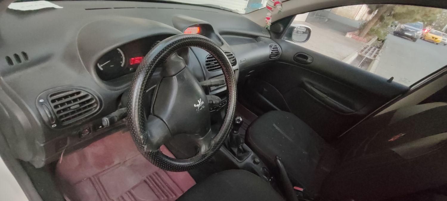 پژو ۲۰۶ صندوق دار v8 - 1391
